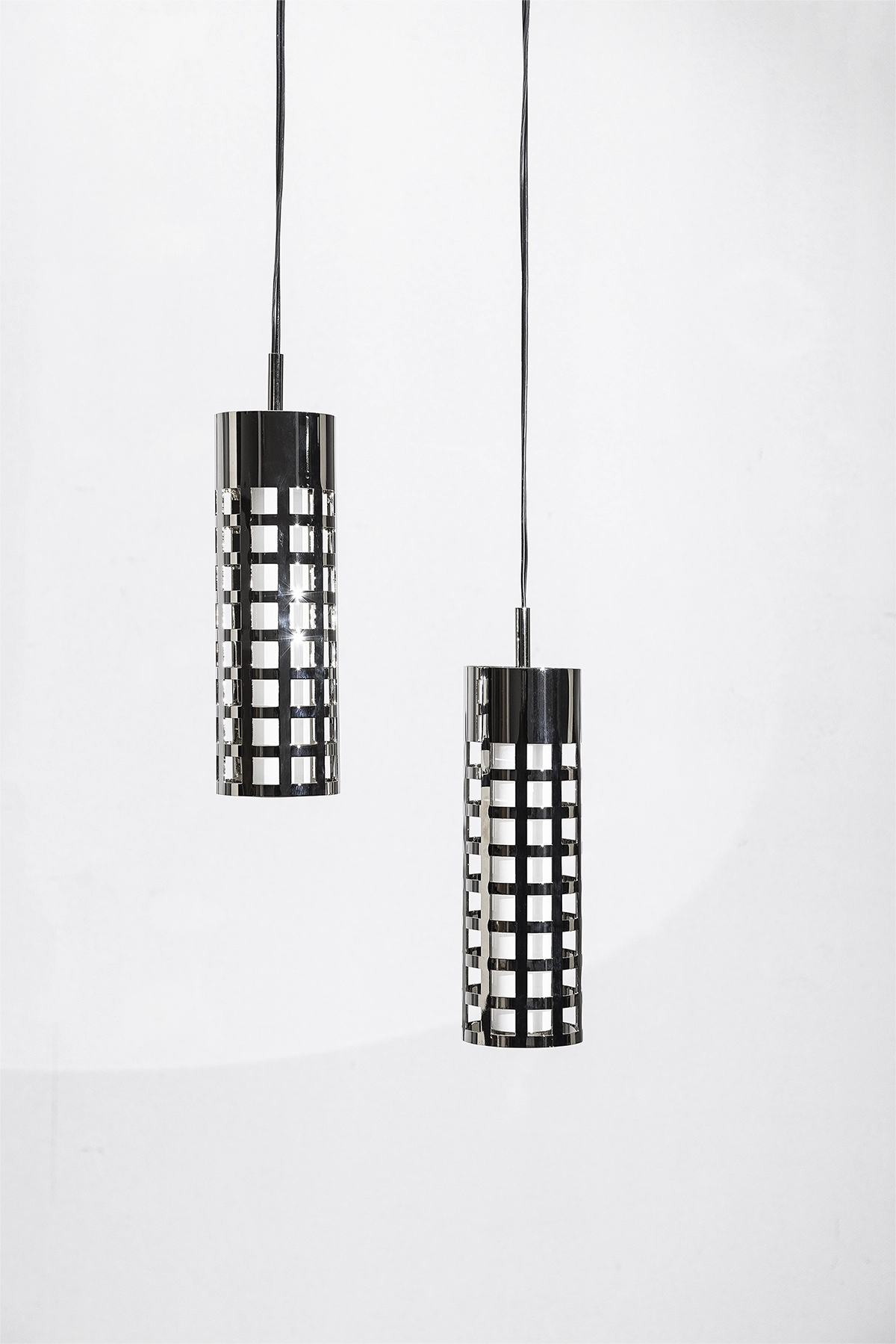 Photographed by Ivo Oliveira Rodrigues and Sanda Vuckovic, the Standing Steel Pendant Lamp by SOFIADEFRANCESCO captivates with its unique blend of light and shadow.